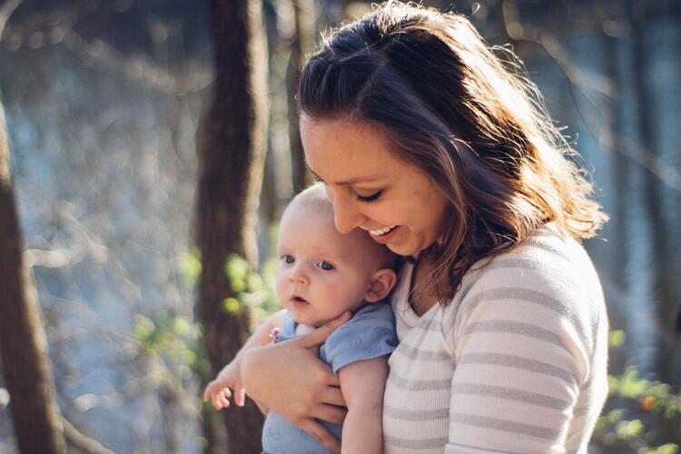 woman holding baby